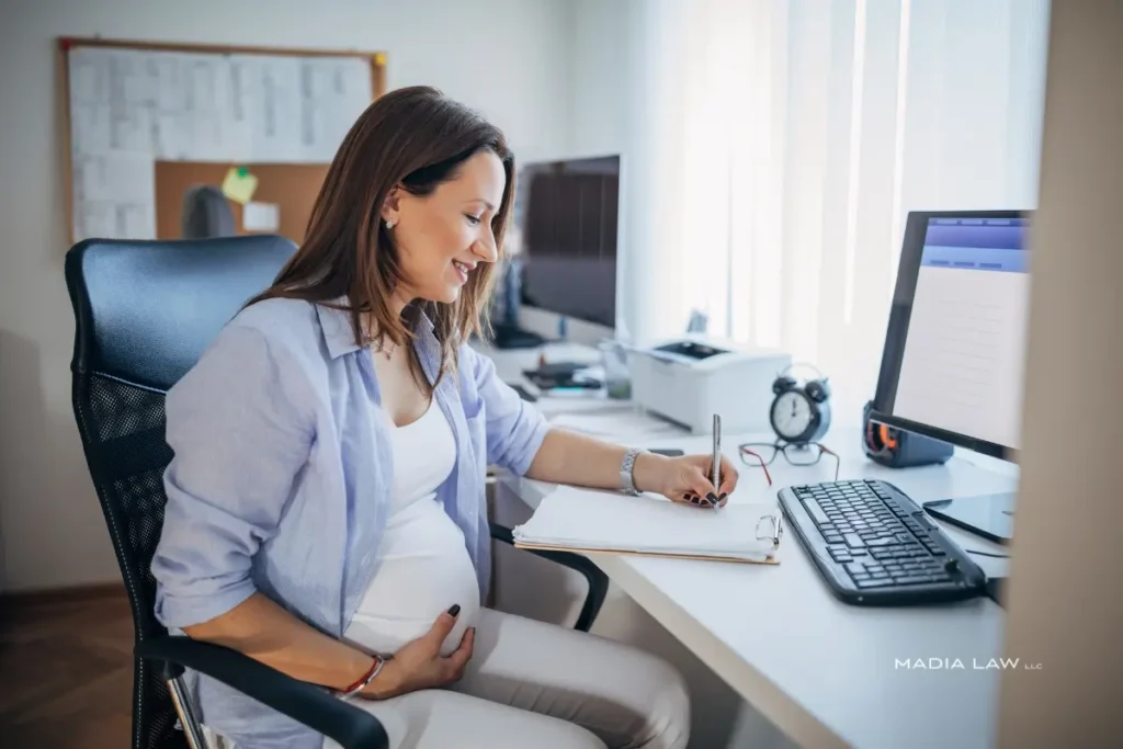 Pregnant women working at office