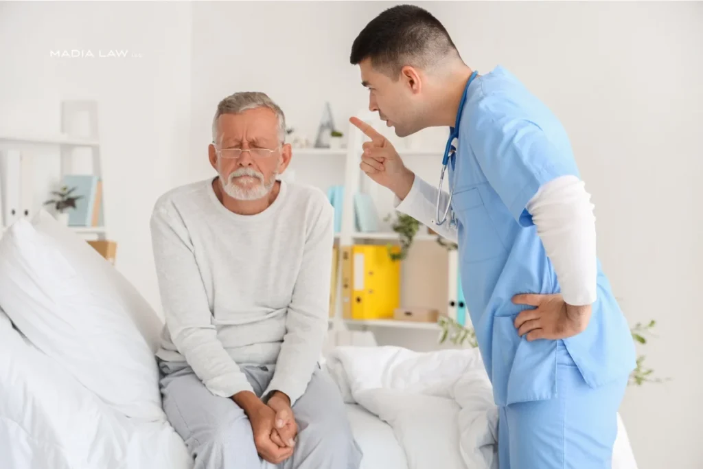Male nurse abusing elderly man