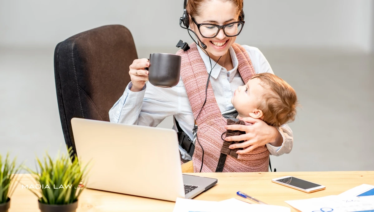 An employee working with an infant in the workplace